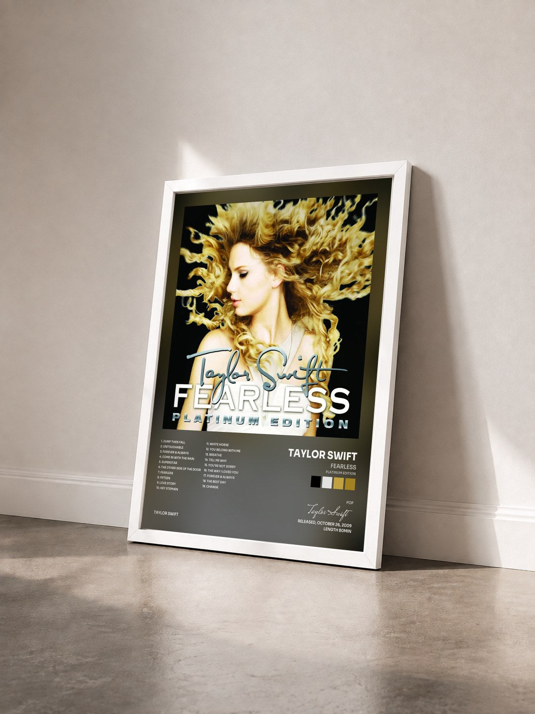 #blanc Tableau de l'album Fearless (Platinum Edition) de Taylor Swift vu de trois quarts, cadre blanc
