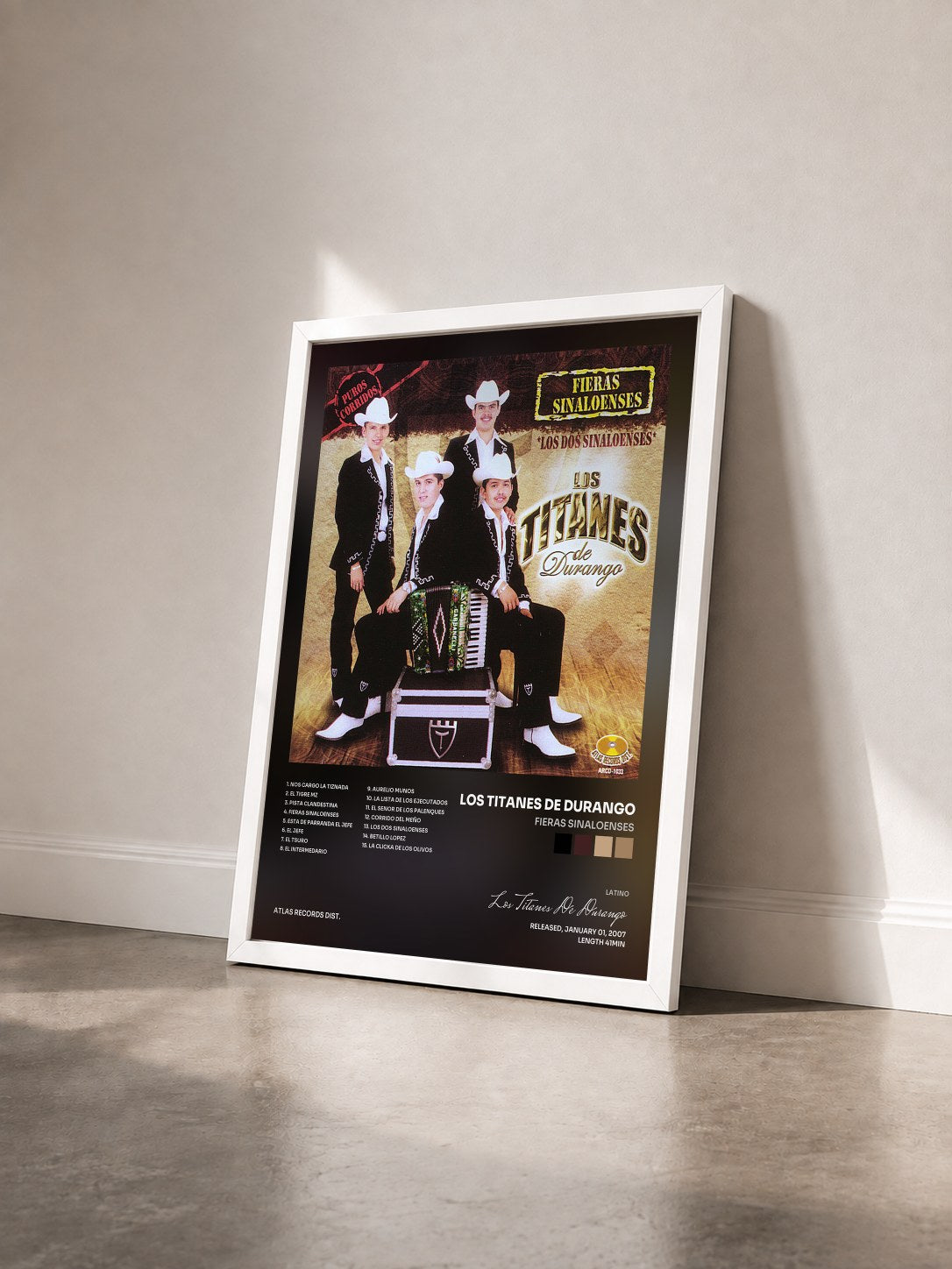 #blanc Tableau de l'album Fieras Sinaloenses de Los Titanes De Durango vu de trois quarts, cadre blanc