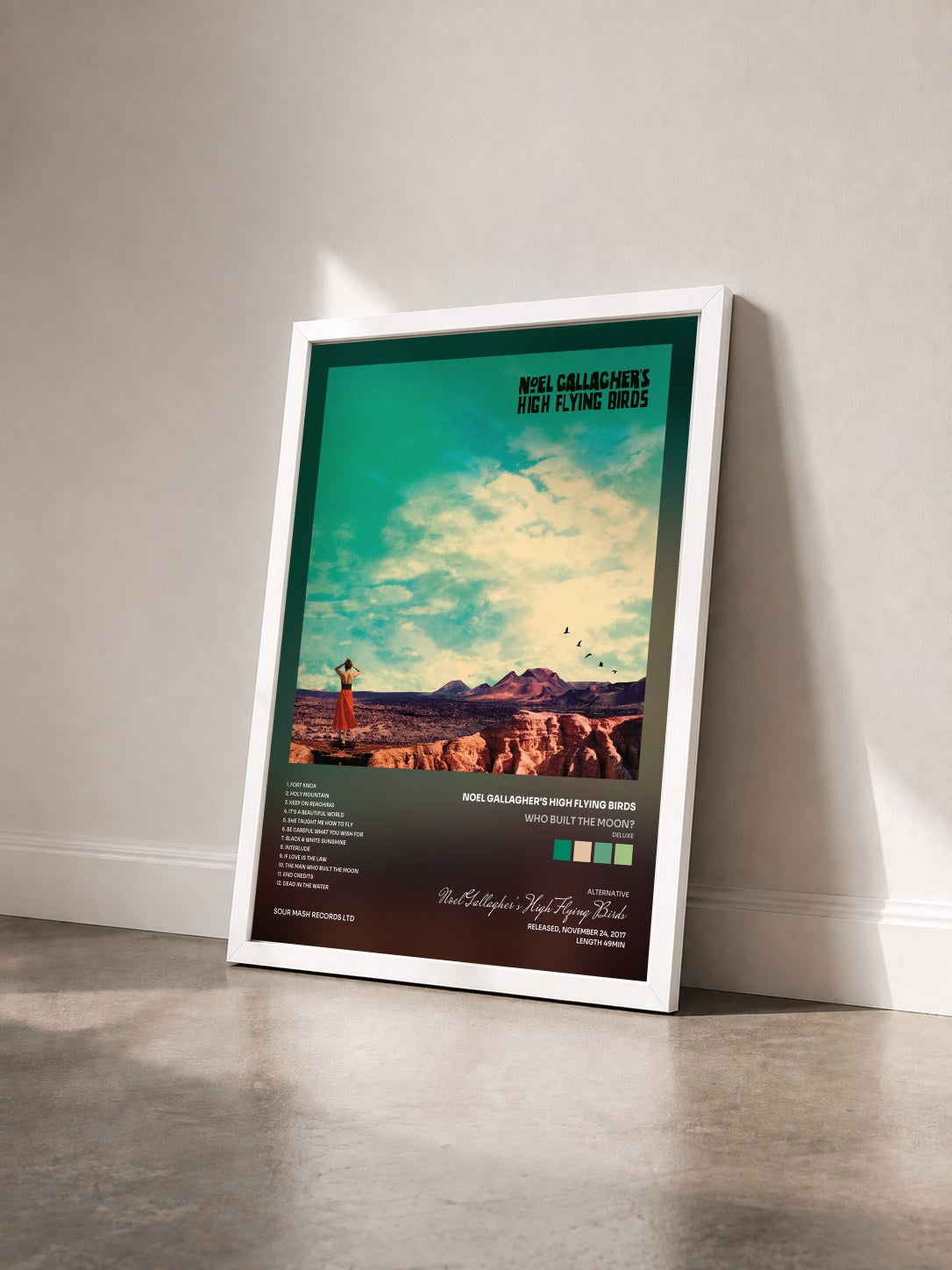#blanc Tableau de l'album Who Built The Moon? (Deluxe) de Noel Gallagher's High Flying Birds vu de trois quarts, cadre blanc