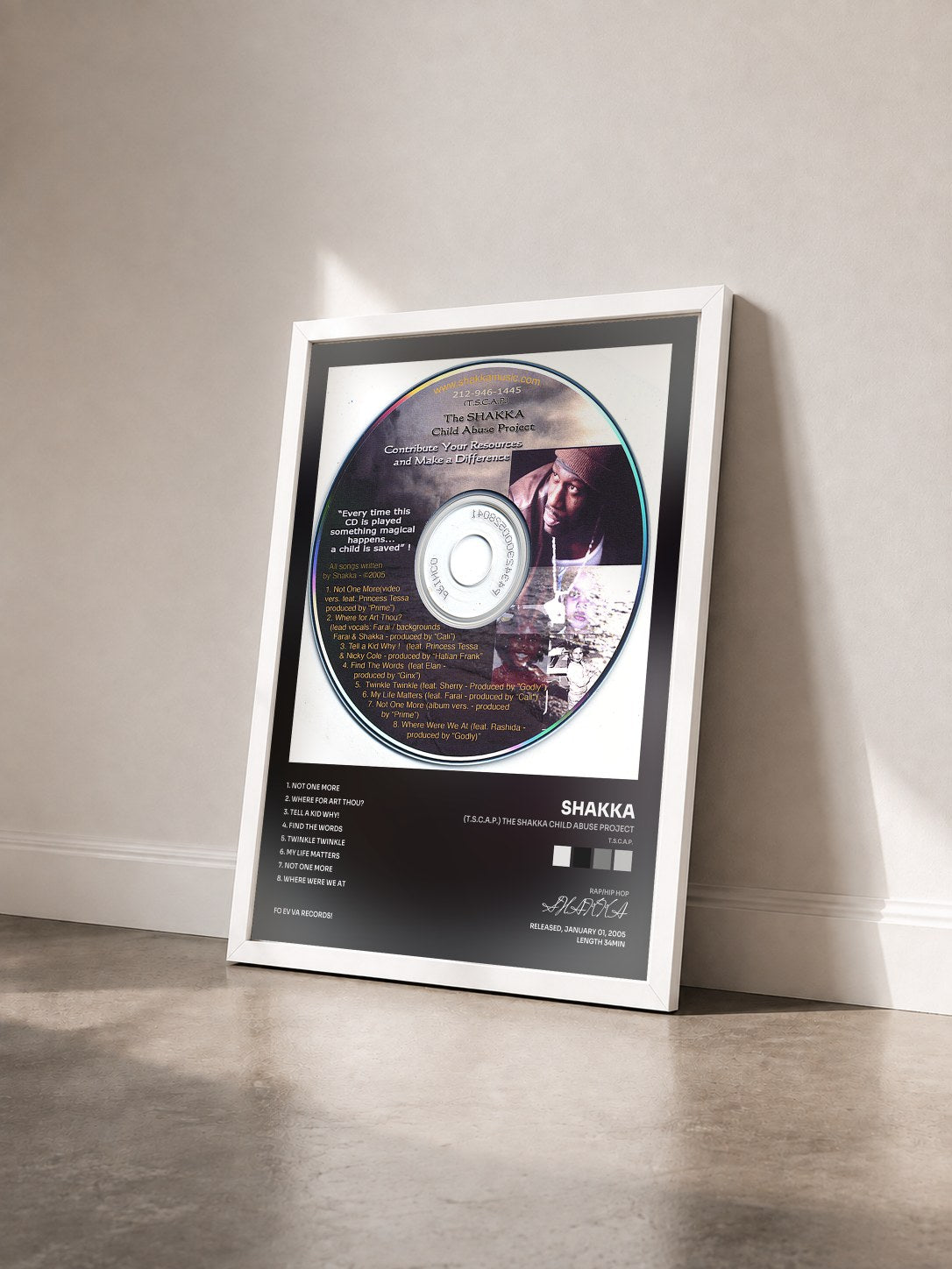 #blanc Tableau de l'album (T.S.C.A.P.) The SHAKKA Child Abuse Project de SHAKKA vu de trois quarts, cadre blanc