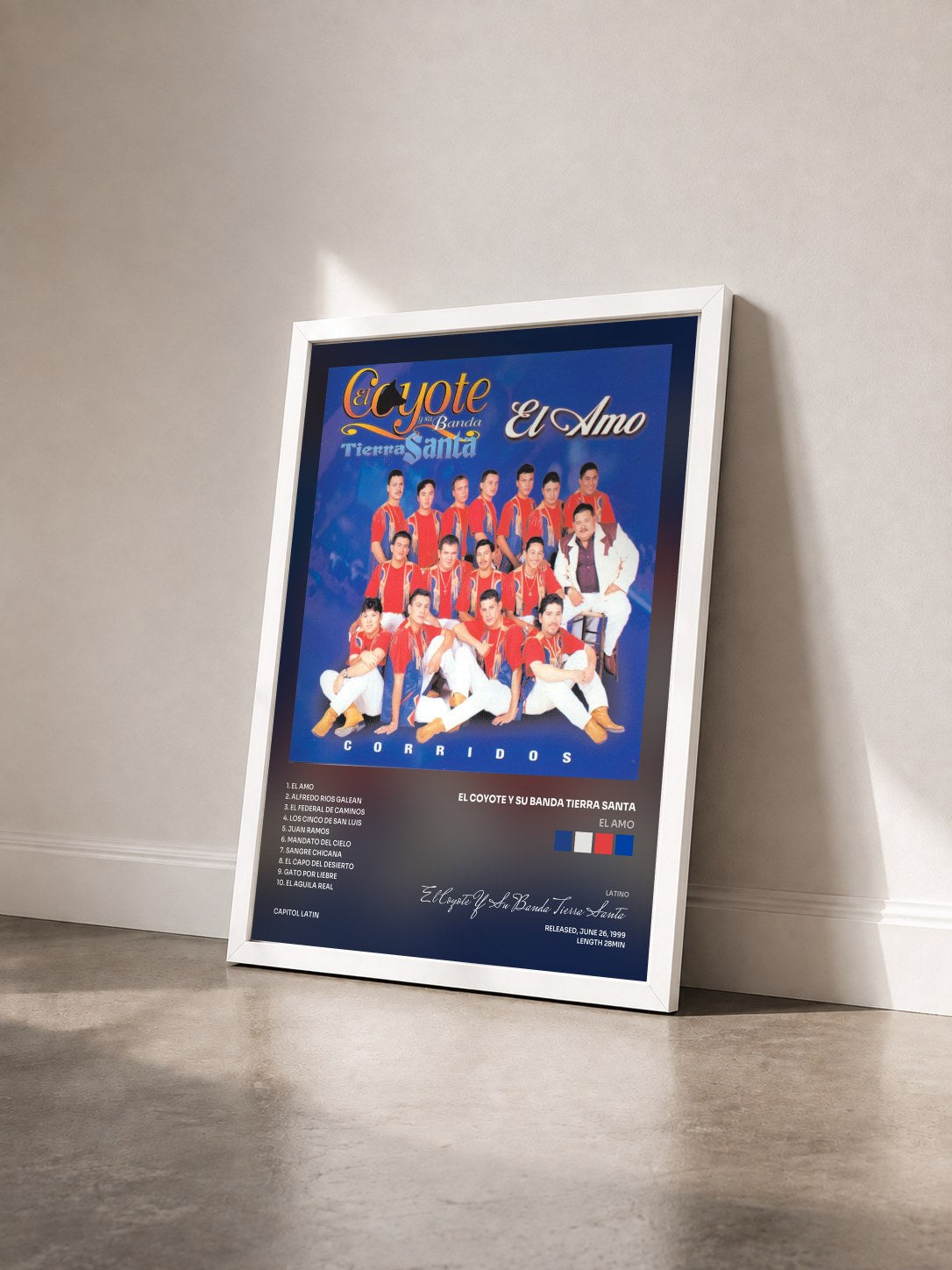 #blanc Tableau de l'album El Amo de El Coyote Y Su Banda Tierra Santa vu de trois quarts, cadre blanc