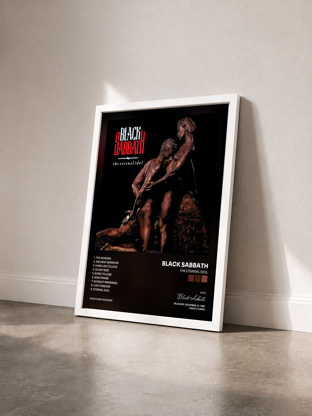 #blanc Tableau de l'album The Eternal Idol de Black Sabbath vu de trois quarts, cadre blanc