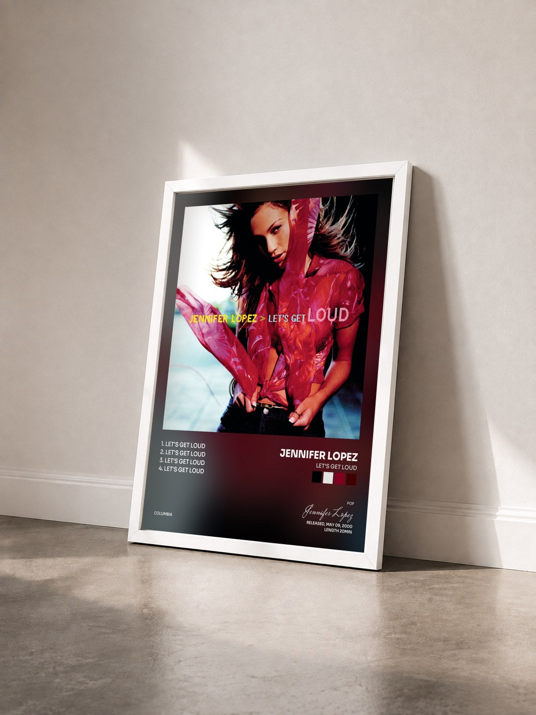 #blanc Tableau de l'album Let's Get Loud de Jennifer Lopez vu de trois quarts, cadre blanc