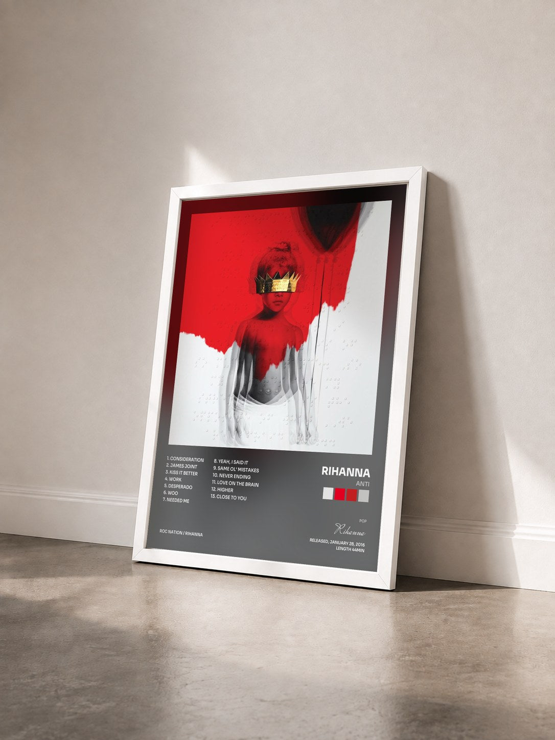 #blanc Tableau de l'album ANTI de Rihanna vu de trois quarts, cadre blanc