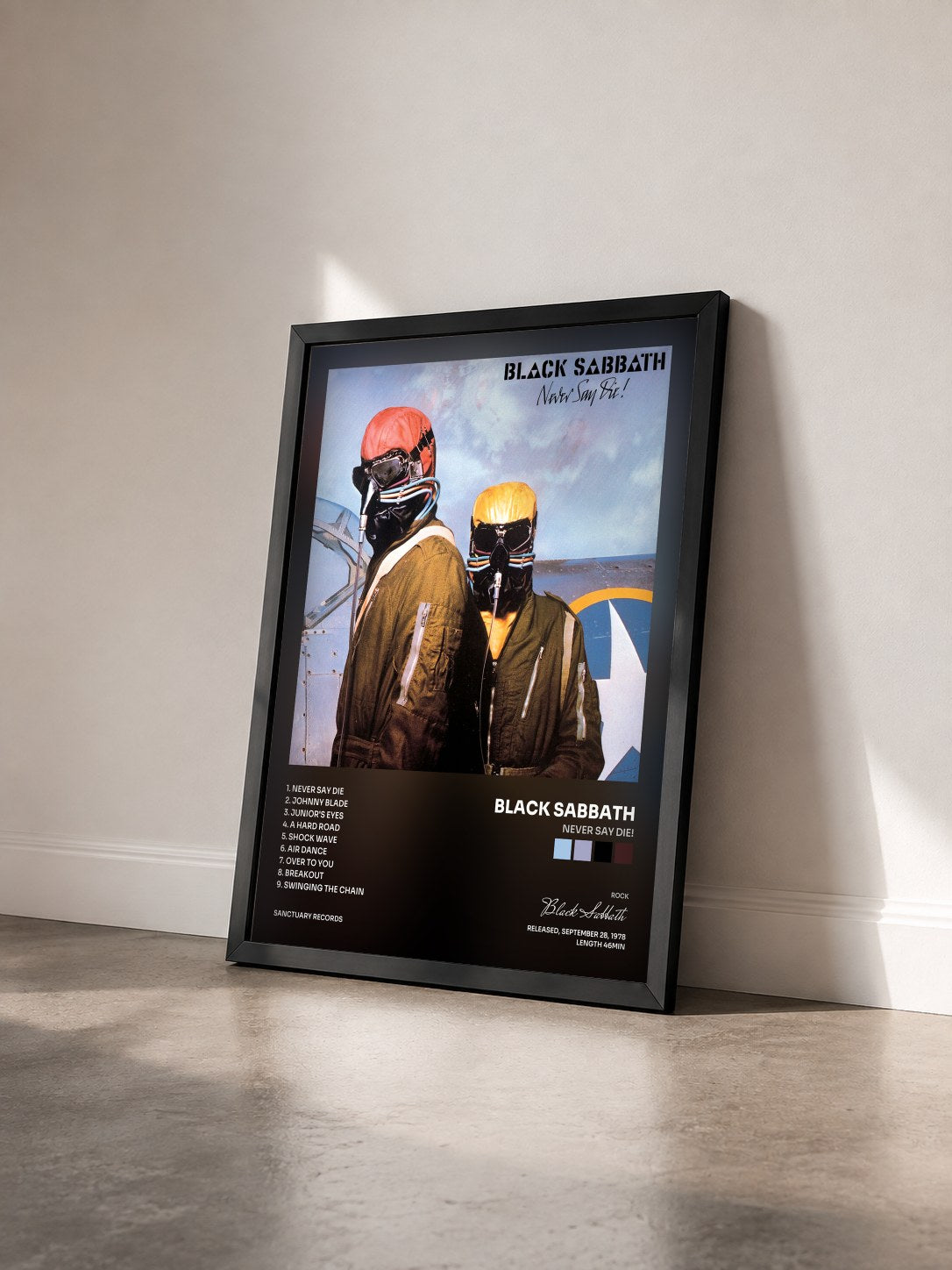 #noir Tableau de l'album Never Say Die! de Black Sabbath vu de trois quarts, cadre noir