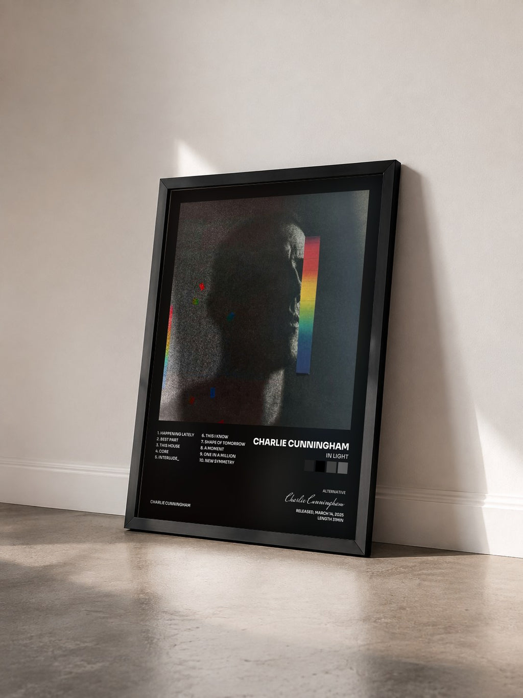 #noir Tableau de l'album In Light de Charlie Cunningham vu de trois quarts, cadre noir