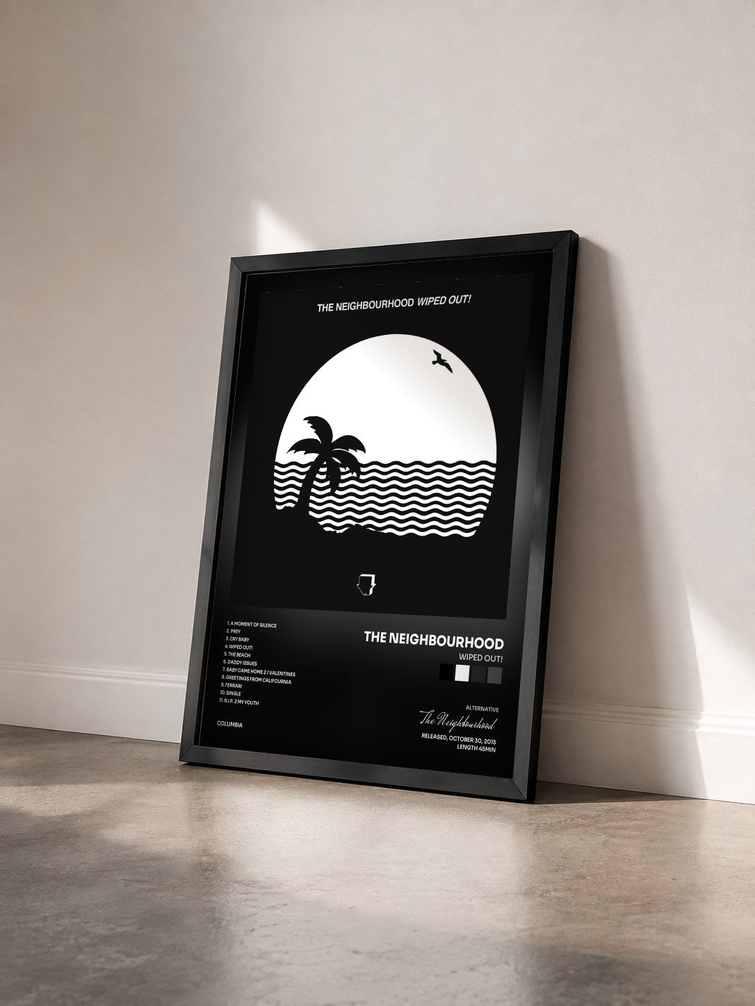#noir Tableau de l'album Wiped Out! de The Neighbourhood vu de trois quarts, cadre noir