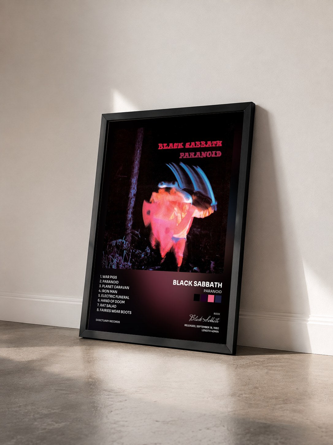 #noir Tableau de l'album Paranoid de Black Sabbath vu de trois quarts, cadre noir