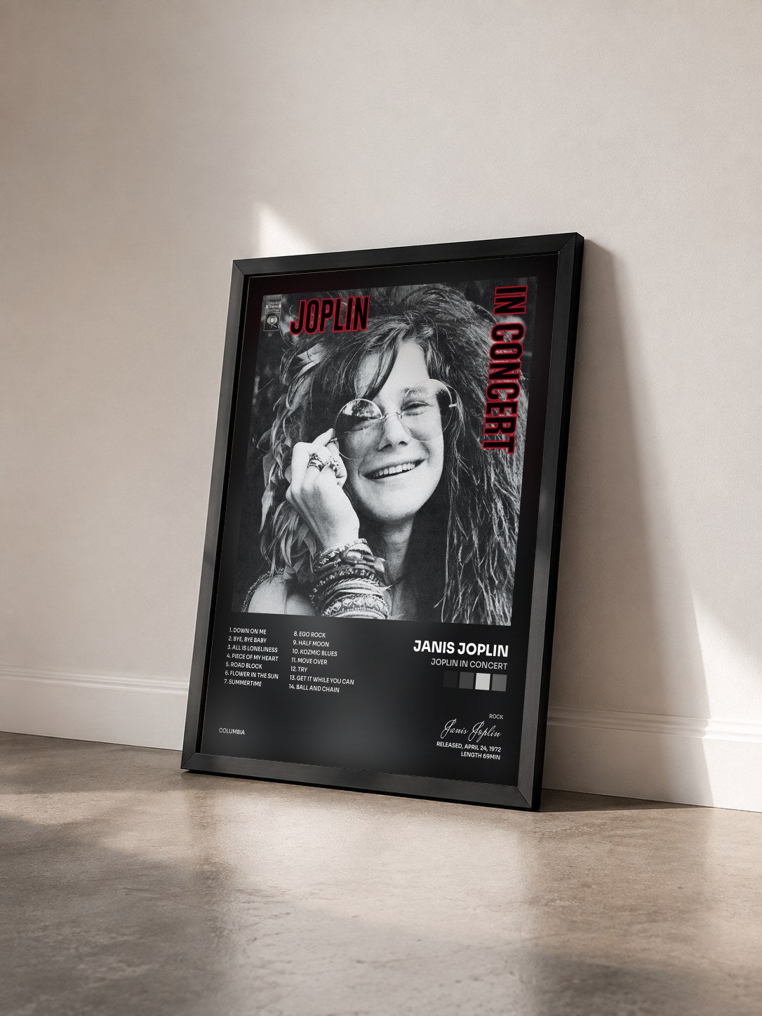 #noir Joplin In Concert by Janis Joplin as a framed art print seen at an angle, black frame