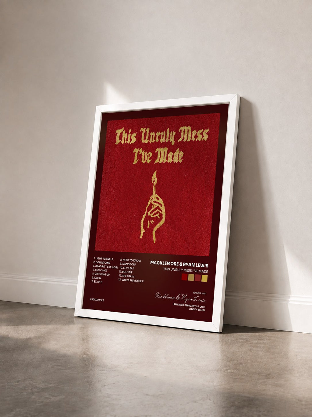 #blanc Tableau de l'album This Unruly Mess I've Made de Macklemore & Ryan Lewis vu de trois quarts, cadre blanc