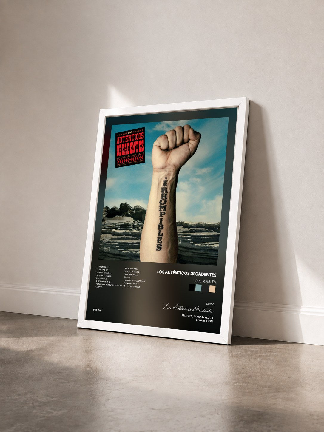 #blanc Tableau de l'album Irrompibles de Los Auténticos Decadentes vu de trois quarts, cadre blanc