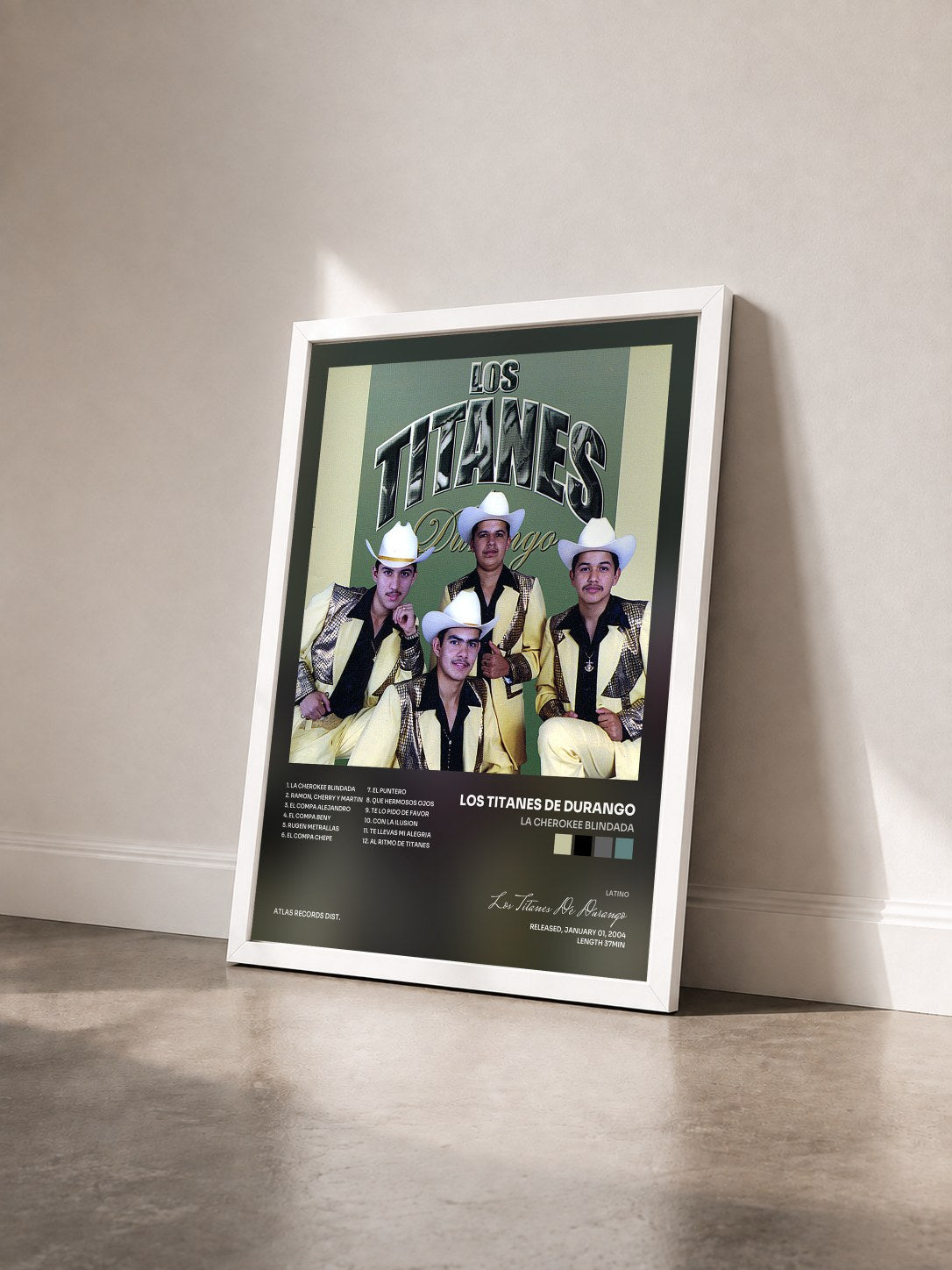#blanc Tableau de l'album La Cherokee Blindada de Los Titanes De Durango vu de trois quarts, cadre blanc