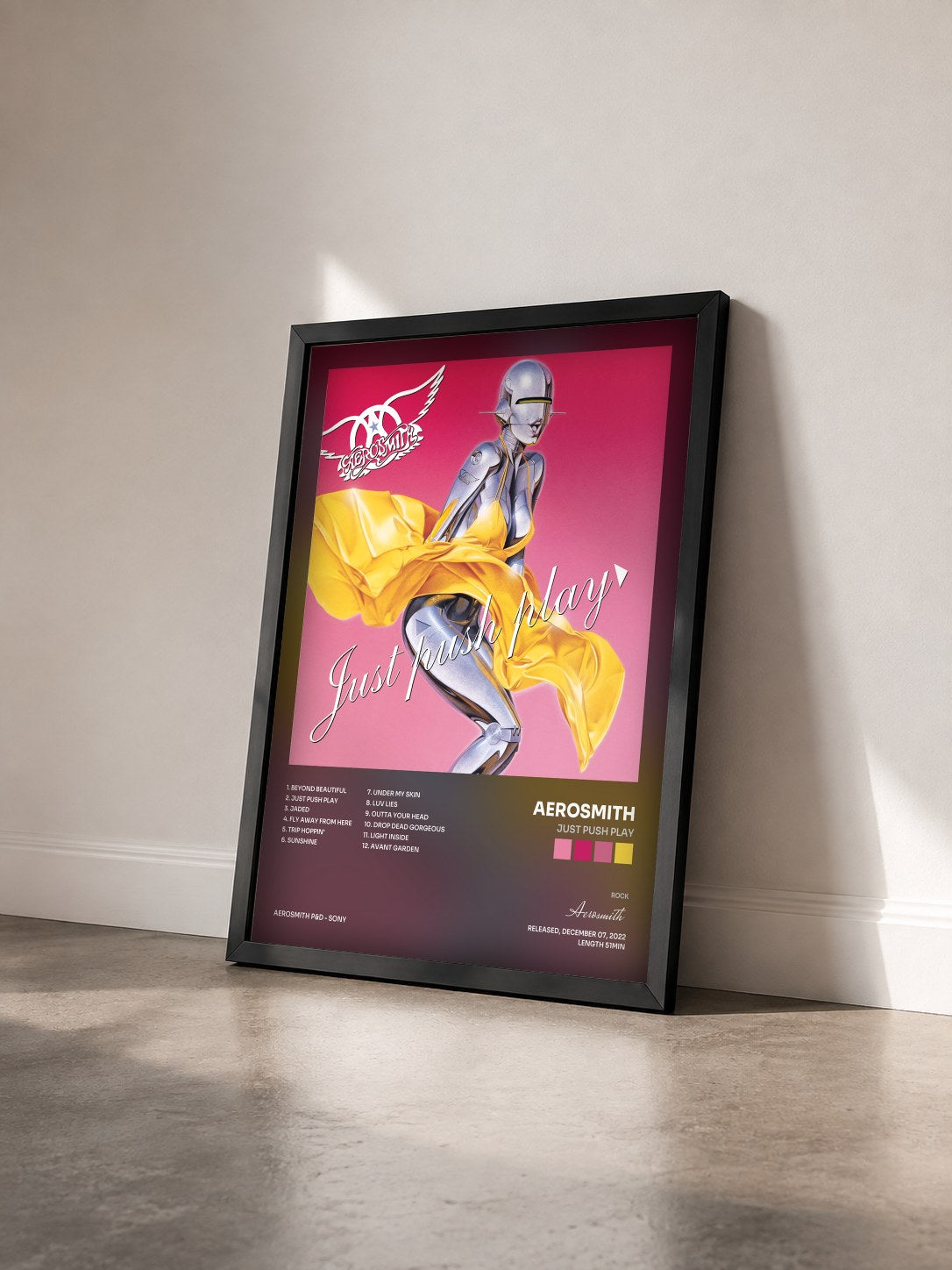 #noir Tableau de l'album Just Push Play de Aerosmith vu de trois quarts, cadre noir