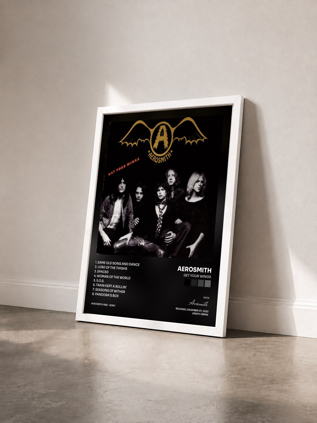 #blanc Tableau de l'album Get Your Wings de Aerosmith vu de trois quarts, cadre blanc