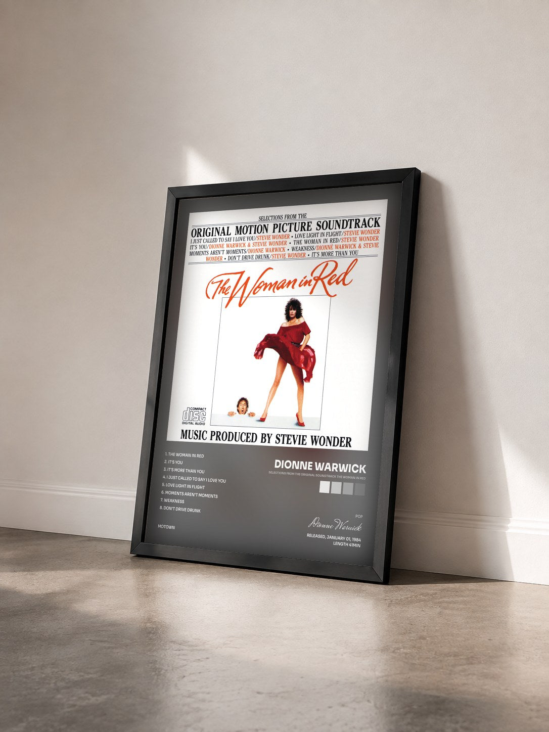 #noir Tableau de l'album Selections From The Original Soundtrack The Woman In Red de Dionne Warwick vu de trois quarts, cadre noir