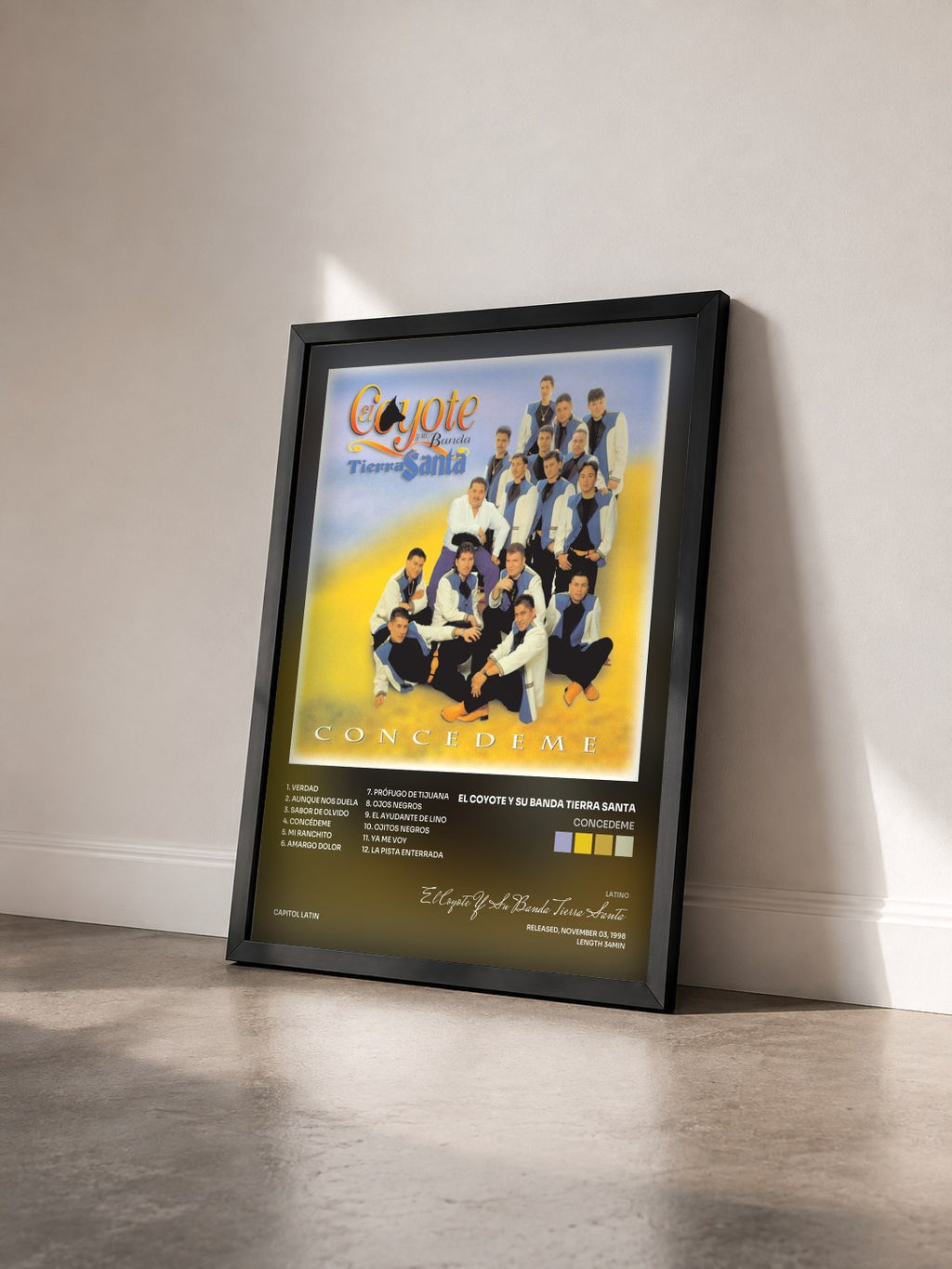 #noir Tableau de l'album Concedeme de El Coyote Y Su Banda Tierra Santa vu de trois quarts, cadre noir
