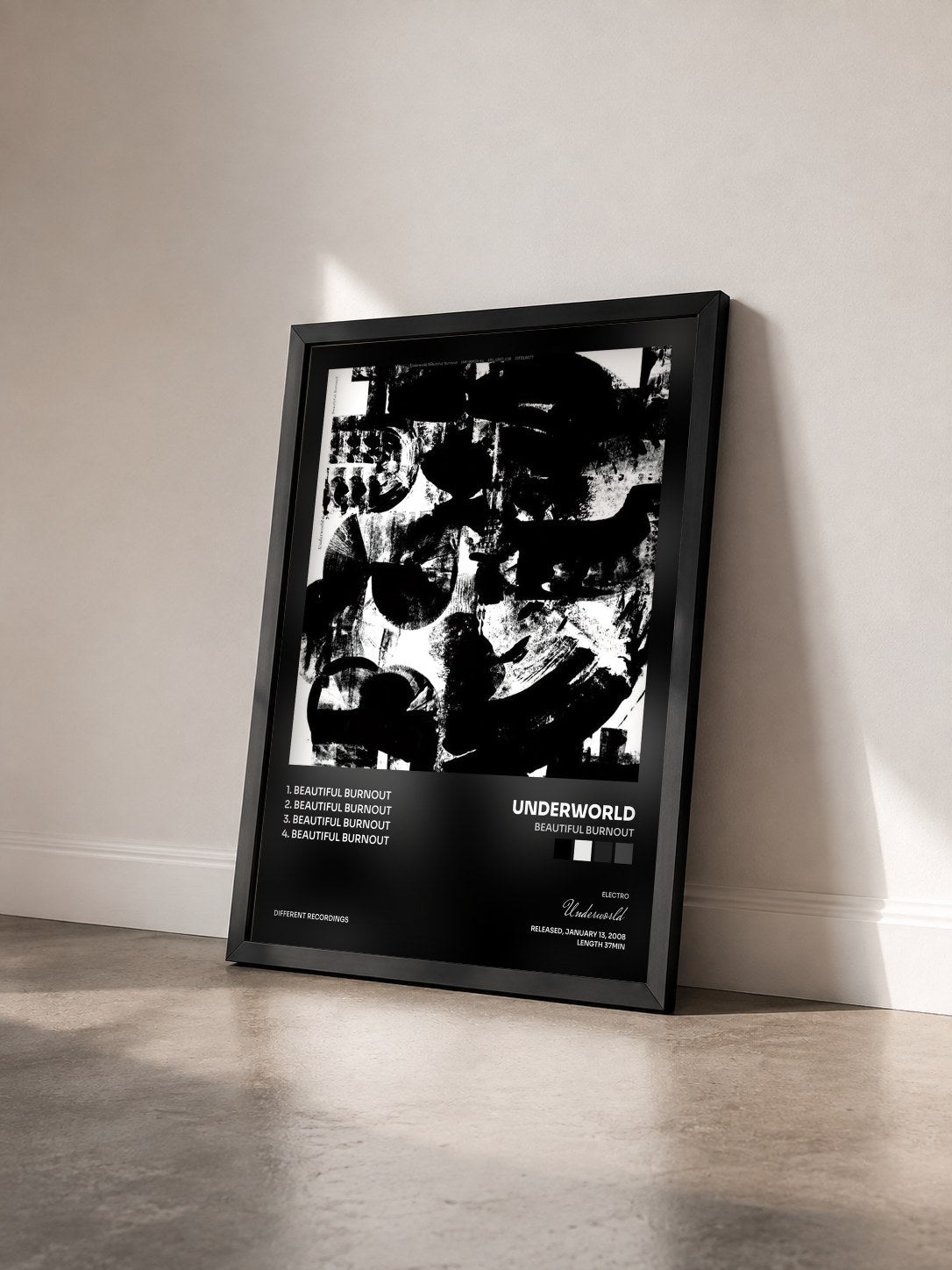 #noir Tableau de l'album Beautiful Burnout de Underworld vu de trois quarts, cadre noir