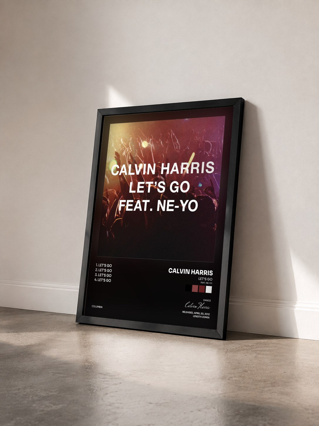#noir Tableau de l'album Let's Go (feat. Ne-Yo) de Calvin Harris vu de trois quarts, cadre noir