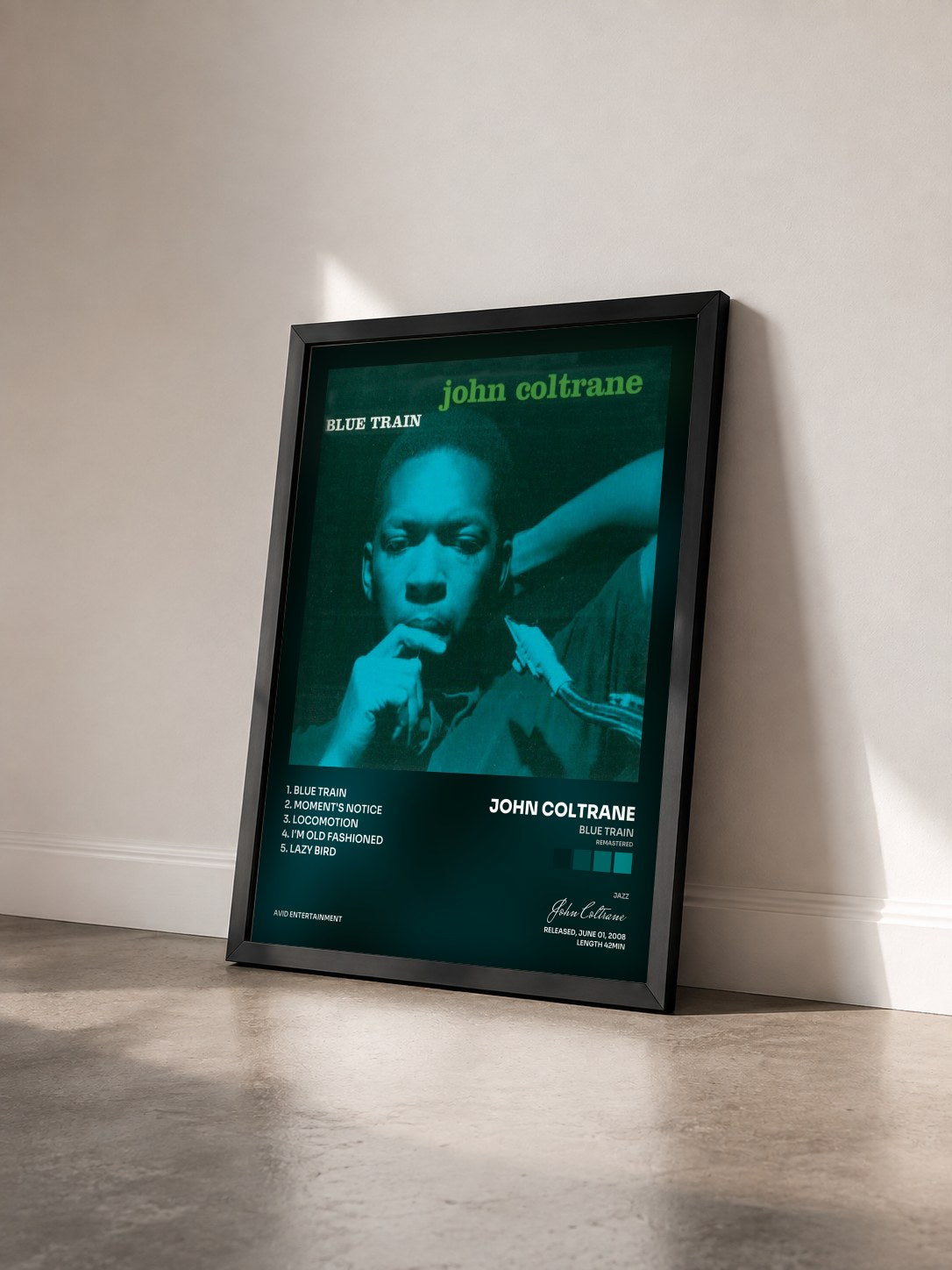 #noir Tableau de l'album Blue Train (Remastered) de John Coltrane vu de trois quarts, cadre noir