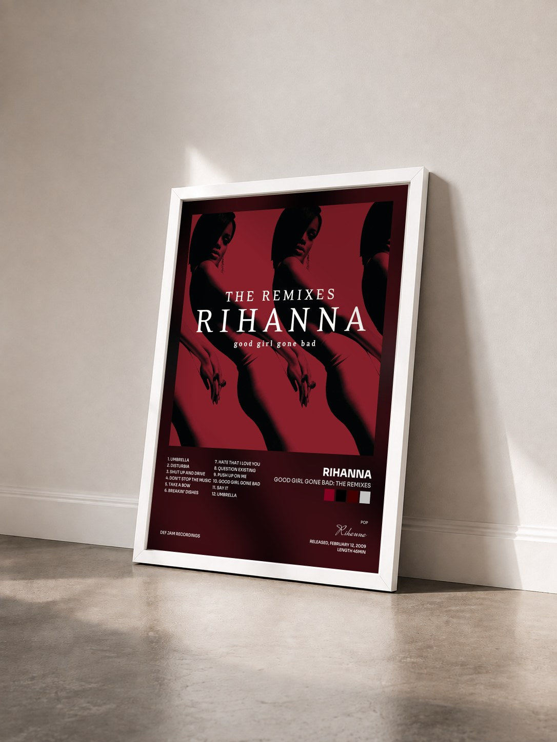 #blanc Tableau de l'album Good Girl Gone Bad: The Remixes de Rihanna vu de trois quarts, cadre blanc