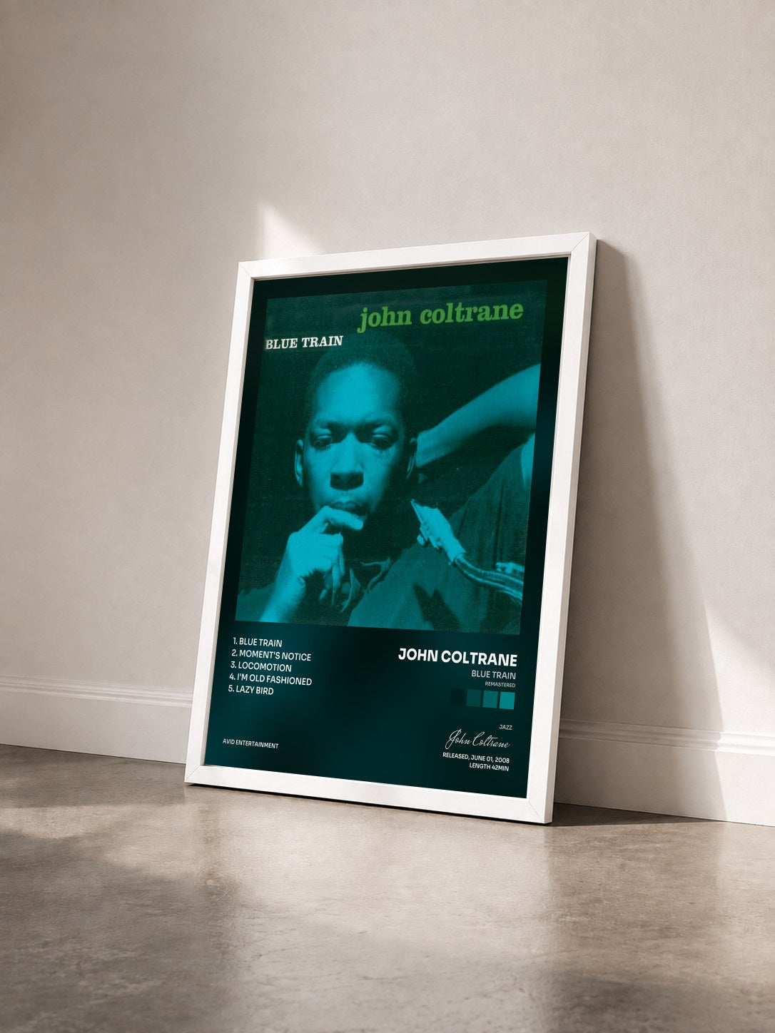 #blanc Tableau de l'album Blue Train (Remastered) de John Coltrane vu de trois quarts, cadre blanc