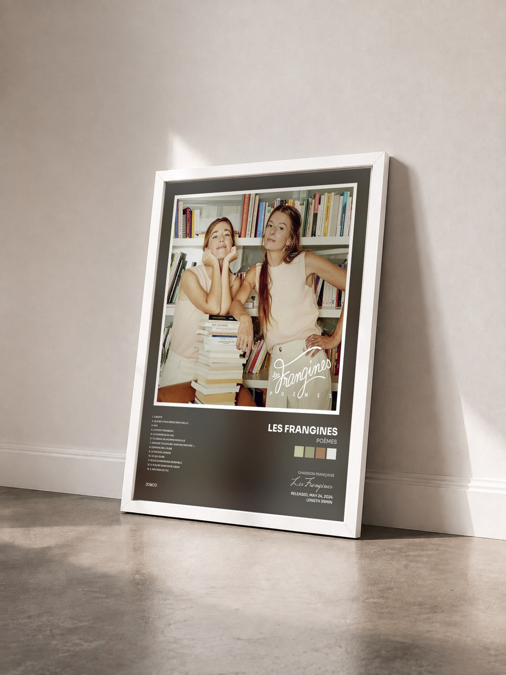 #blanc Tableau de l'album Poèmes de Les Frangines vu de trois quarts, cadre blanc
