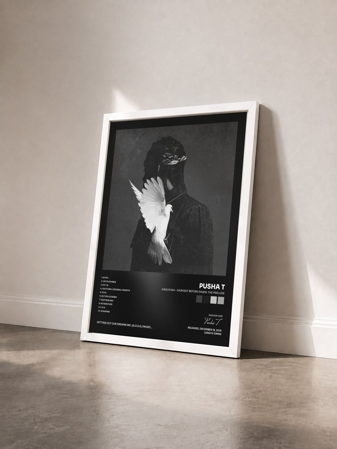#blanc Tableau de l'album King Push – Darkest Before Dawn: The Prelude de Pusha T vu de trois quarts, cadre blanc
