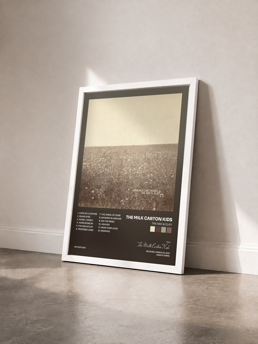 #blanc Tableau de l'album The Ash & Clay de The Milk Carton Kids vu de trois quarts, cadre blanc