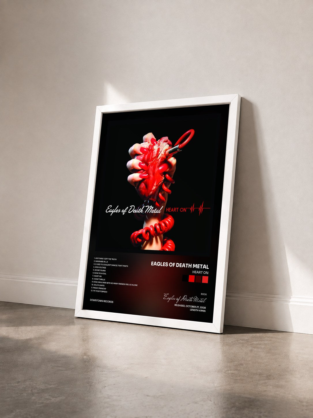 #blanc Tableau de l'album Heart On de Eagles of Death Metal vu de trois quarts, cadre blanc
