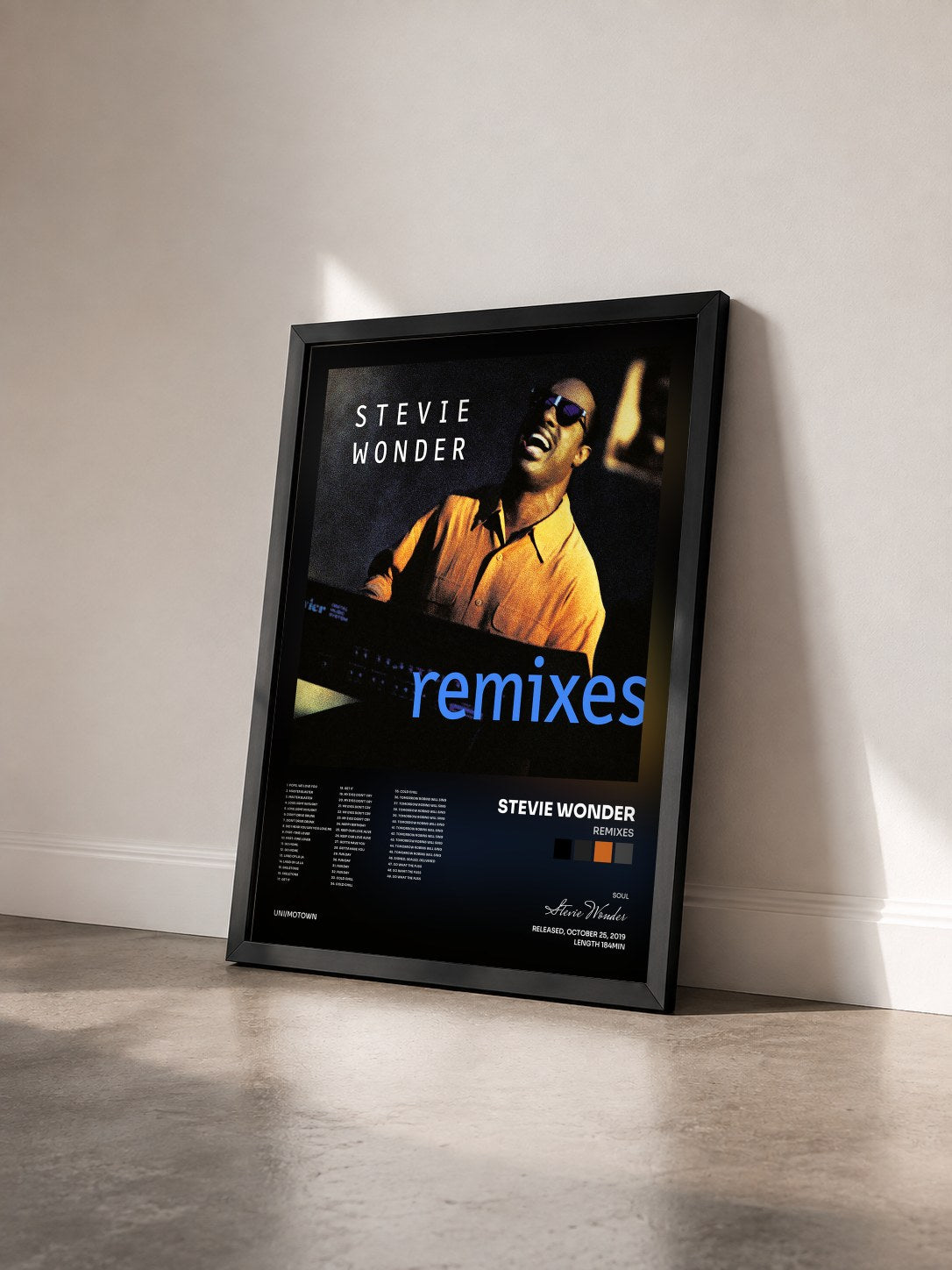 #noir Tableau de l'album Remixes de Stevie Wonder vu de trois quarts, cadre noir