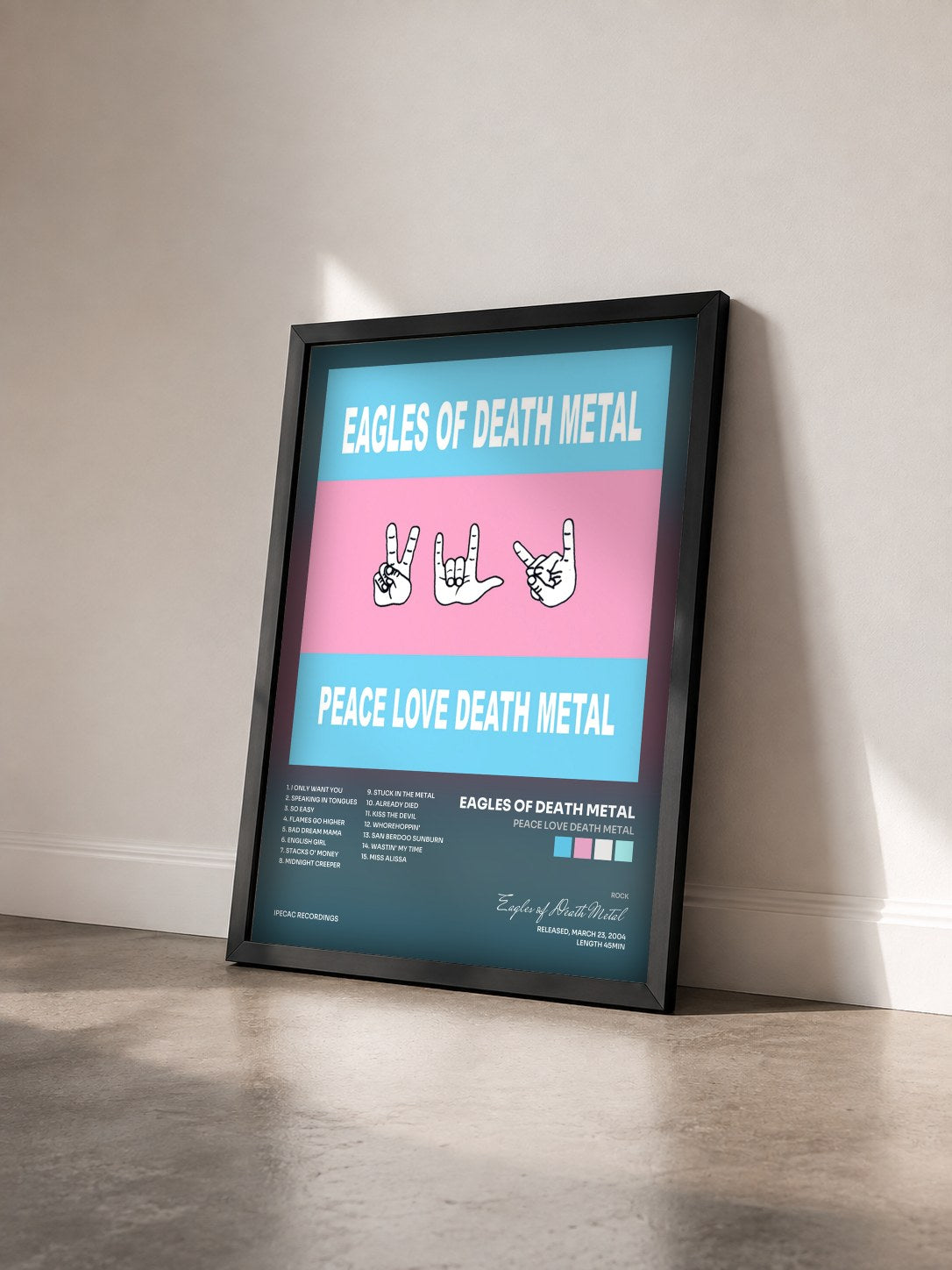 #noir Tableau de l'album Peace Love Death Metal de Eagles of Death Metal vu de trois quarts, cadre noir