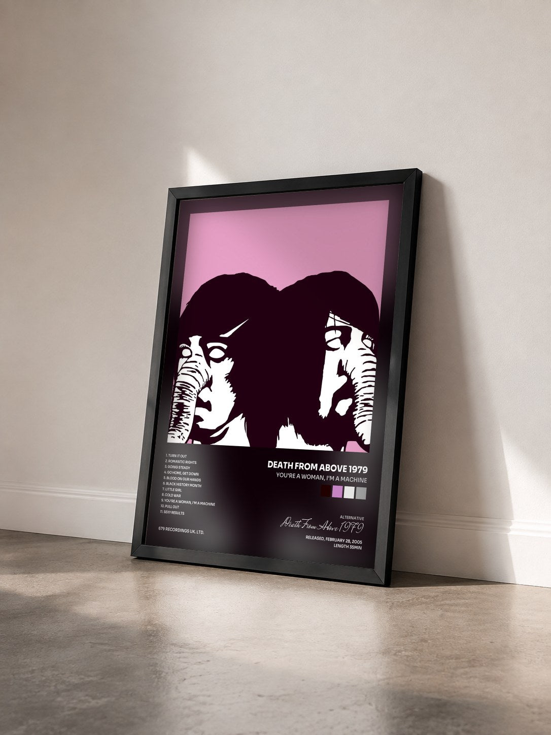 #noir Tableau de l'album You're A Woman, I'm A Machine de Death From Above 1979 vu de trois quarts, cadre noir