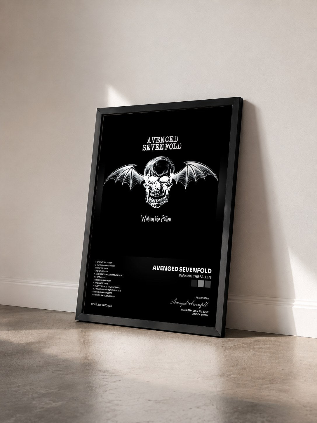 #noir Waking The Fallen by Avenged Sevenfold as a framed art print seen at an angle, black frame
