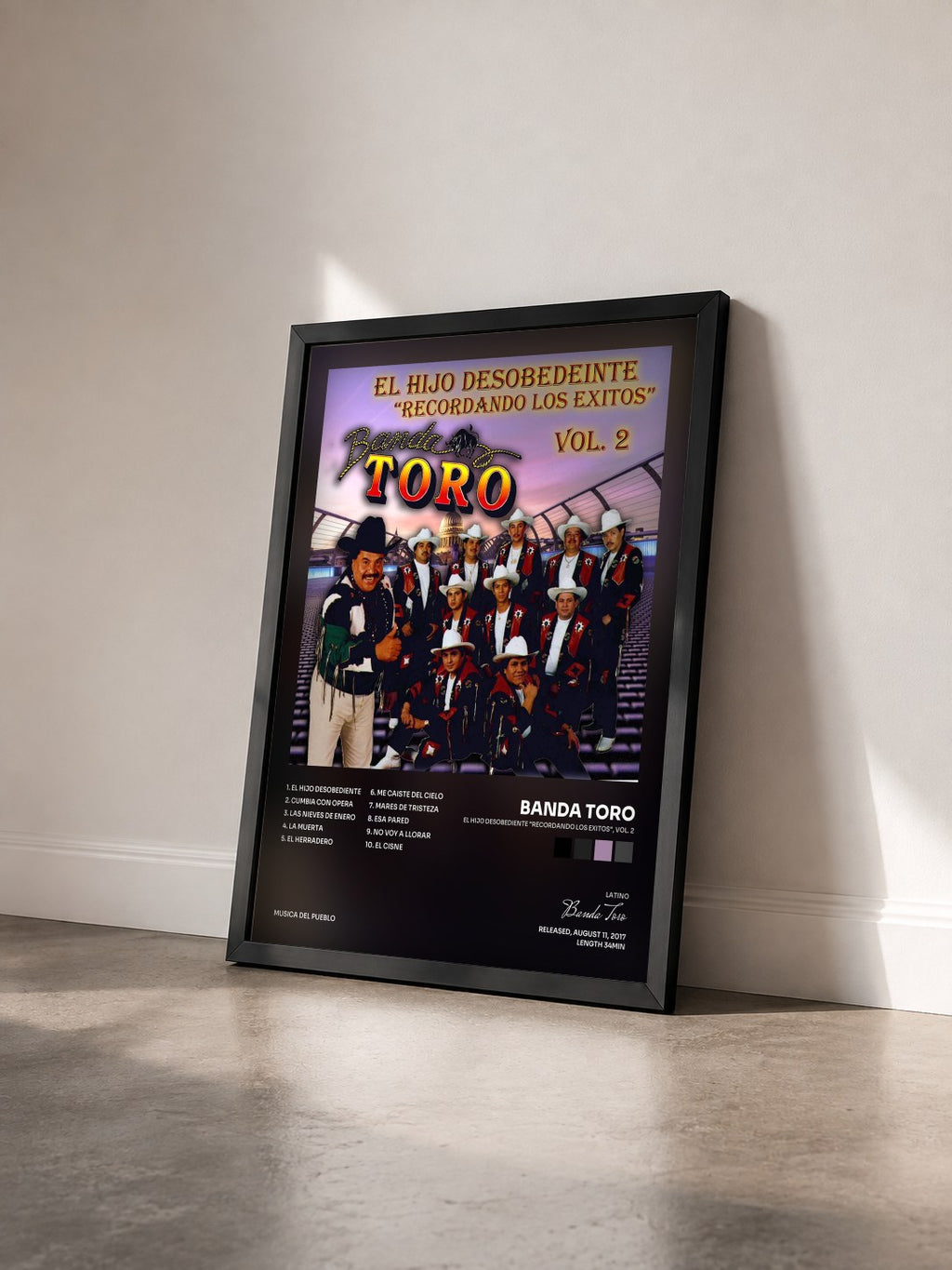 #noir El Hijo Desobediente "Recordando los Exitos", Vol. 2 by Banda Toro as a framed art print seen at an angle, black frame