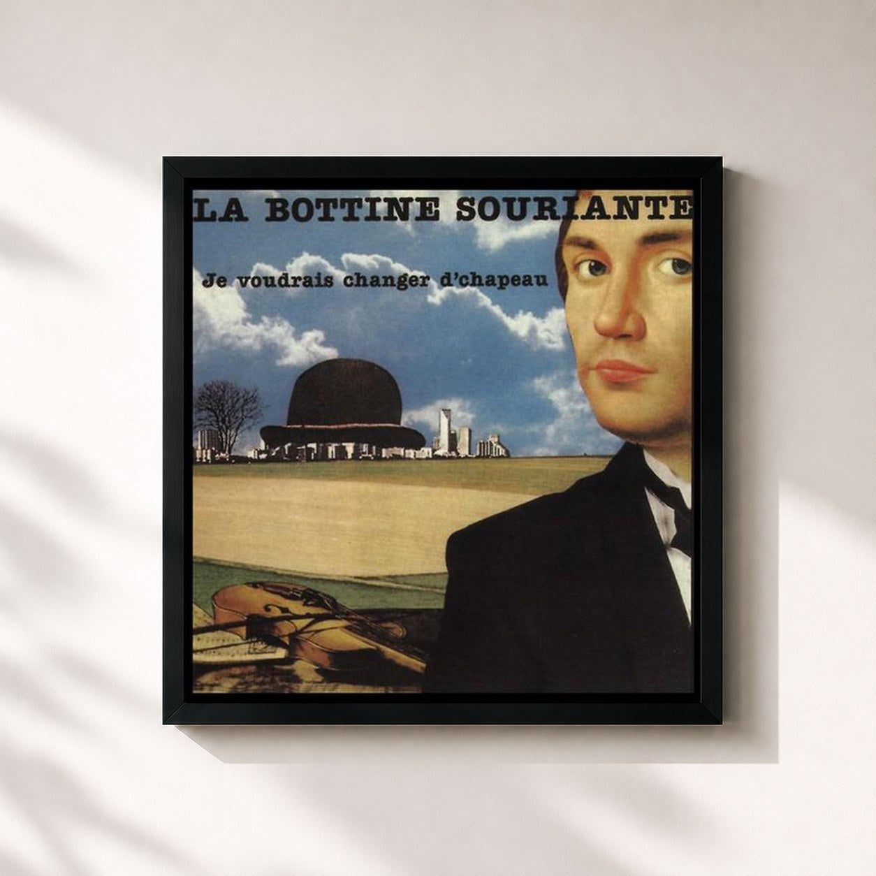 #noir Tableau carré de l'album Je voudrais changer d'chapeau de La Bottine Souriante, cadre noir 32x32 cm
