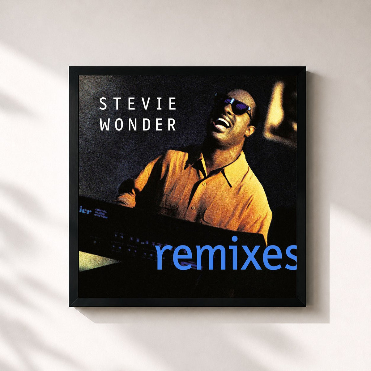 #noir Tableau carré de l'album Remixes de Stevie Wonder, cadre noir 32x32 cm