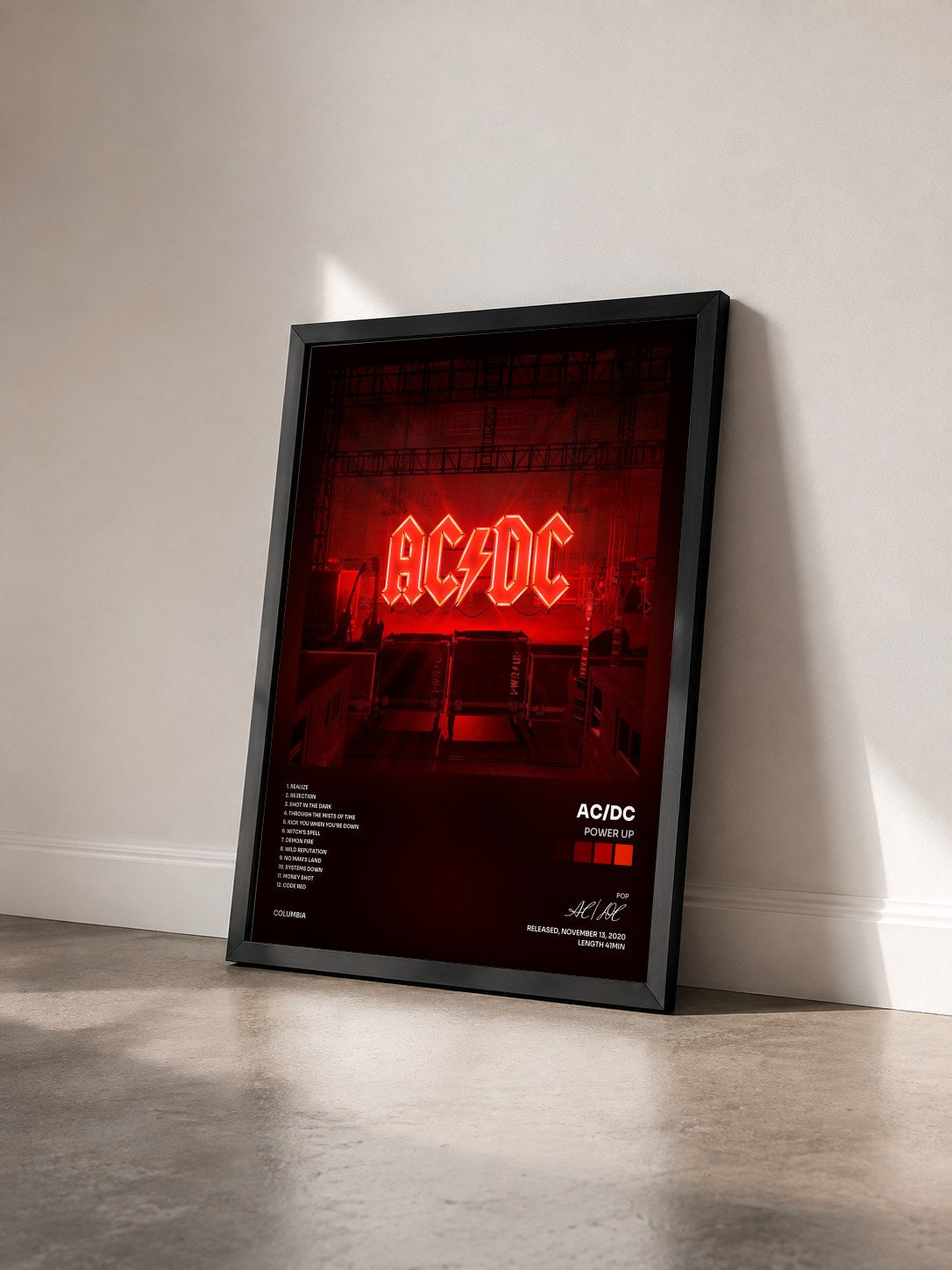 #noir POWER UP by AC/DC as a framed art print seen at an angle, black frame