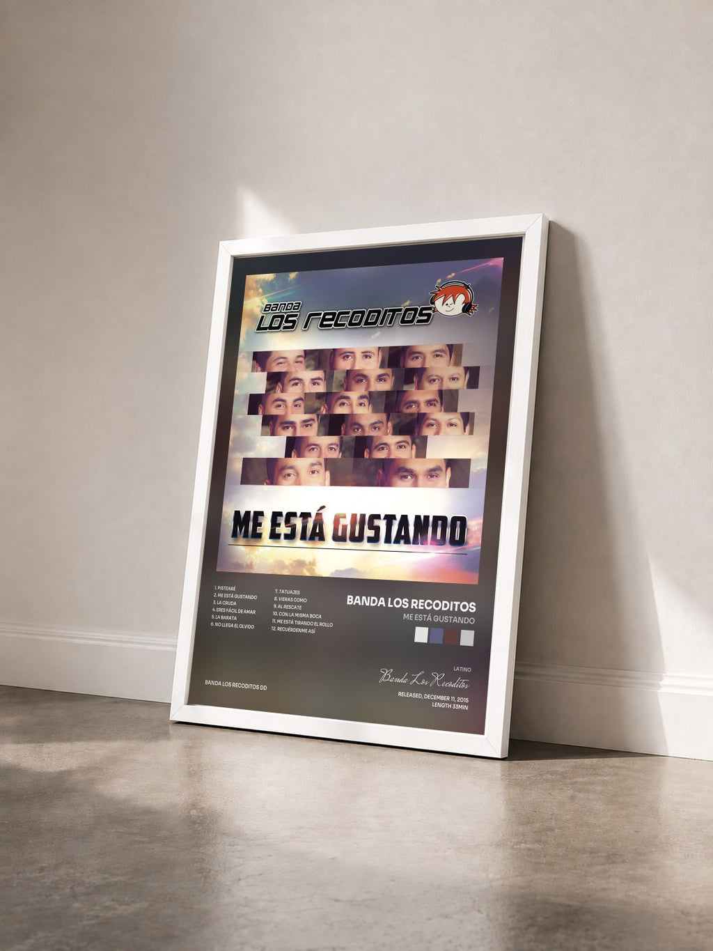 #blanc Tableau de l'album Me Está Gustando de Banda Los Recoditos vu de trois quarts, cadre blanc