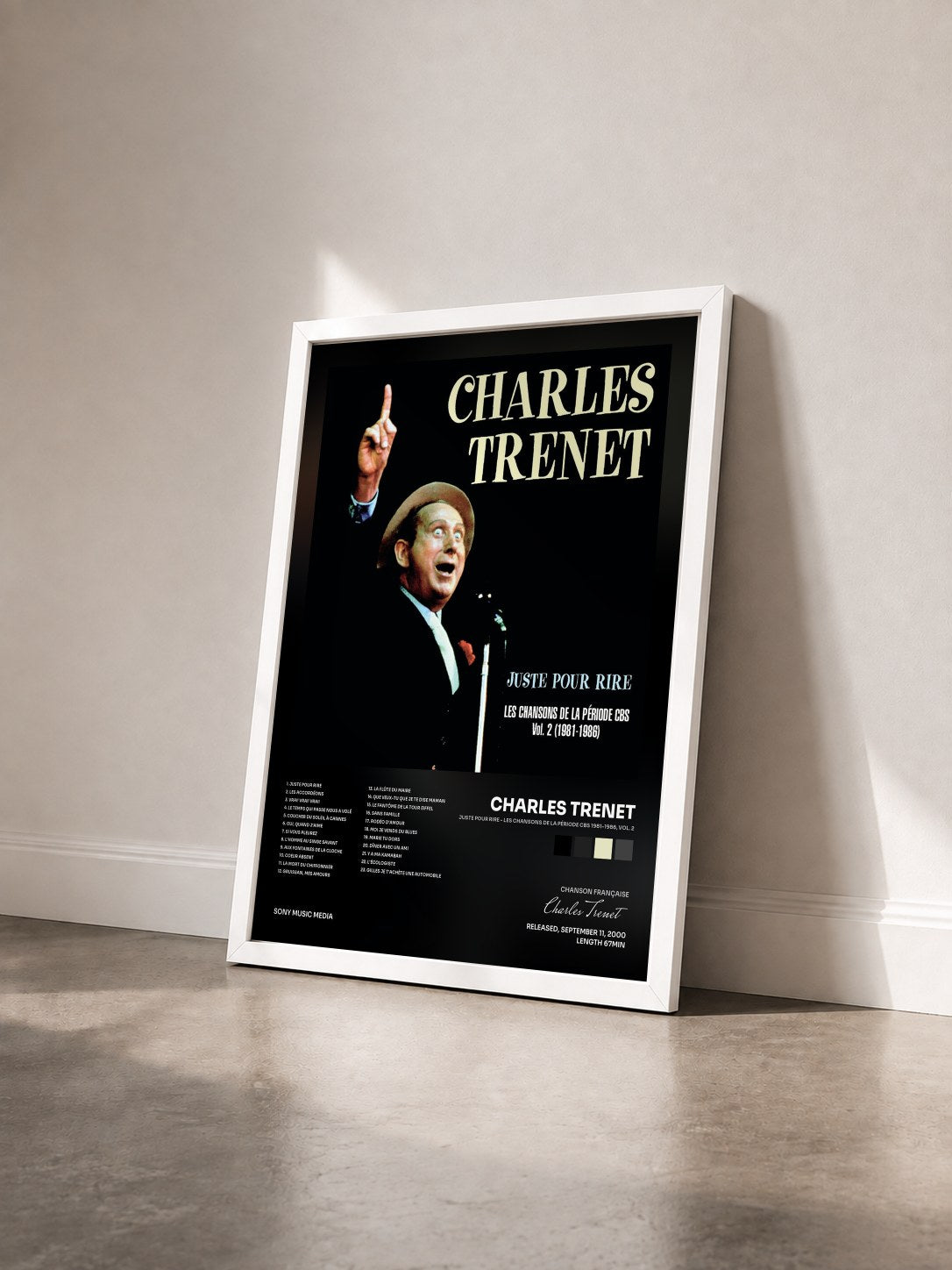 #blanc Tableau de l'album Juste pour rire - Les chansons de la période CBS 1981-1986, Vol. 2 de Charles Trenet vu de trois quarts, cadre blanc