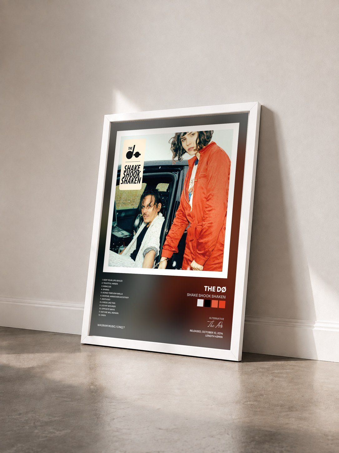 #blanc Shake Shook Shaken by The Dø as a framed art print seen at an angle, white frame