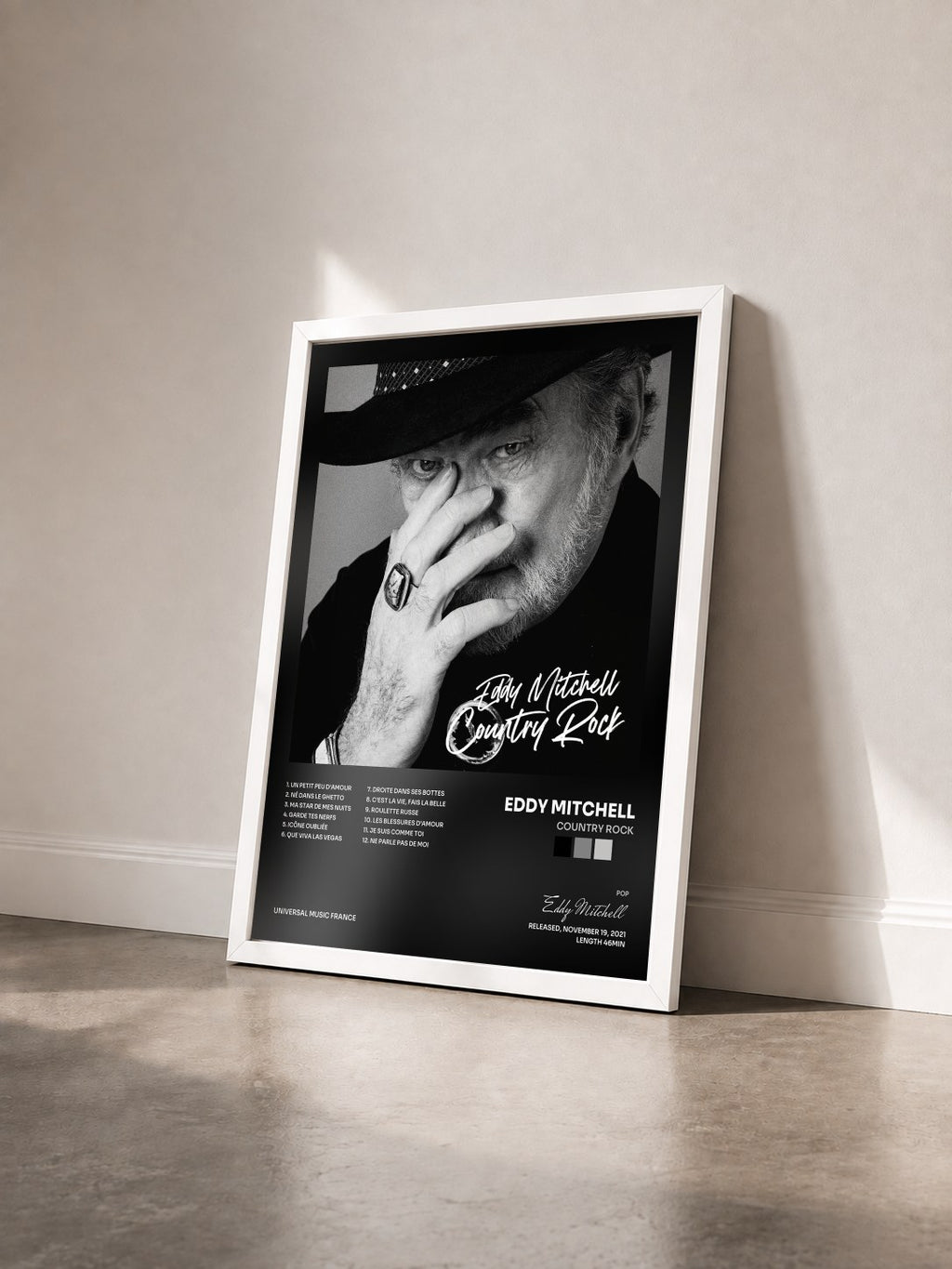 #blanc Tableau de l'album Country Rock de Eddy Mitchell vu de trois quarts, cadre blanc