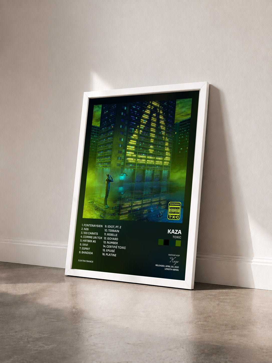 #blanc TOXIC by Kaza as a framed art print seen at an angle, white frame