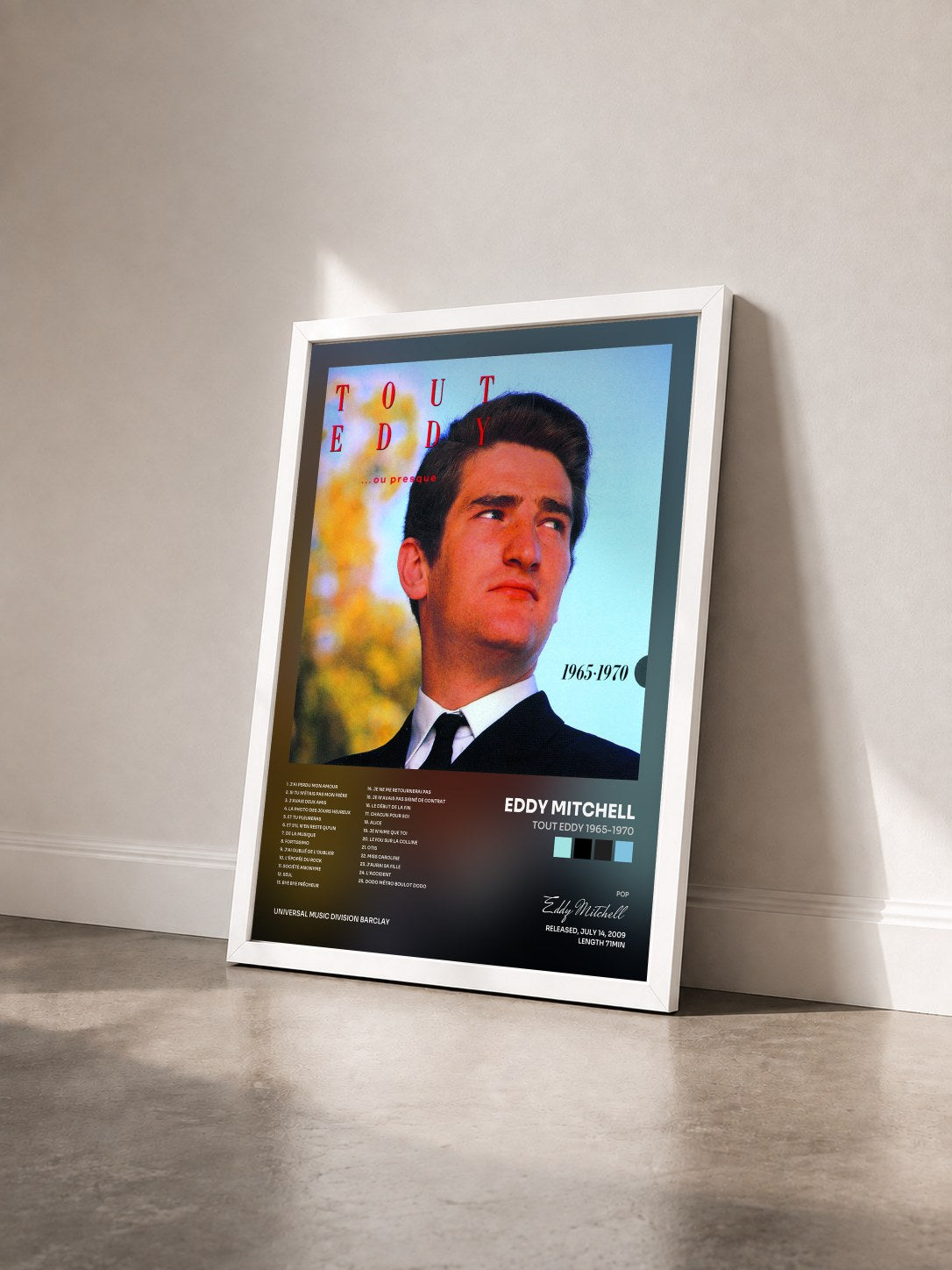 #blanc Tableau de l'album Tout Eddy 1965-1970 de Eddy Mitchell vu de trois quarts, cadre blanc