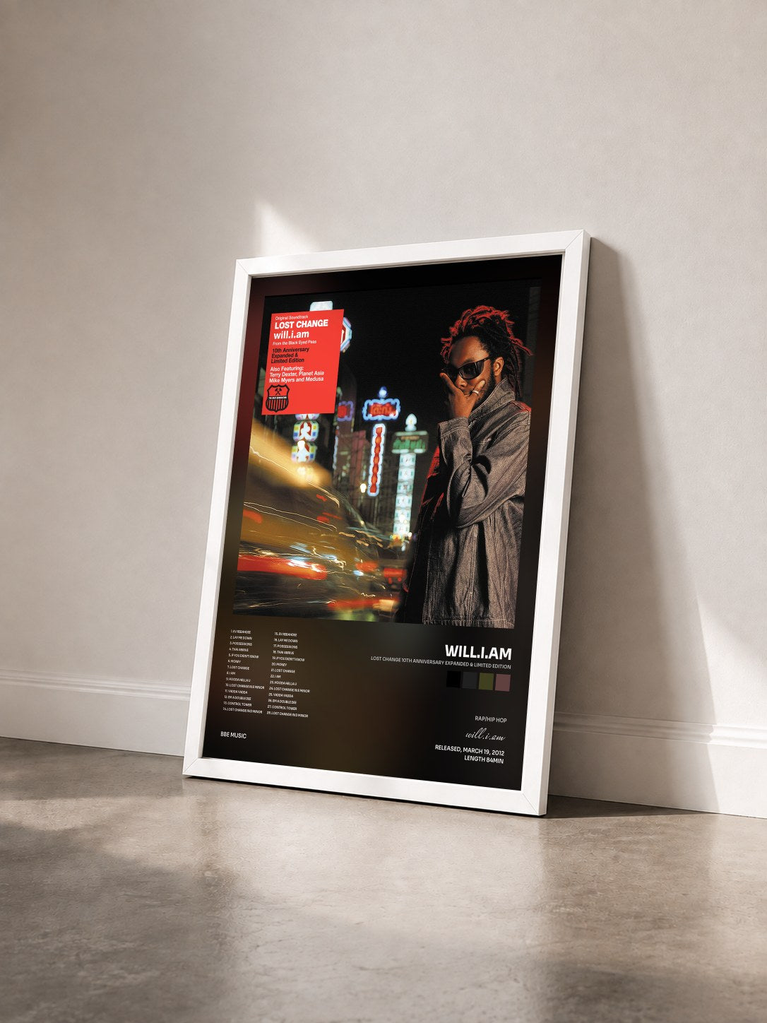 #blanc Lost Change 10th Anniversary Expanded & Limited Edition by will.i.am as a framed art print seen at an angle, white frame