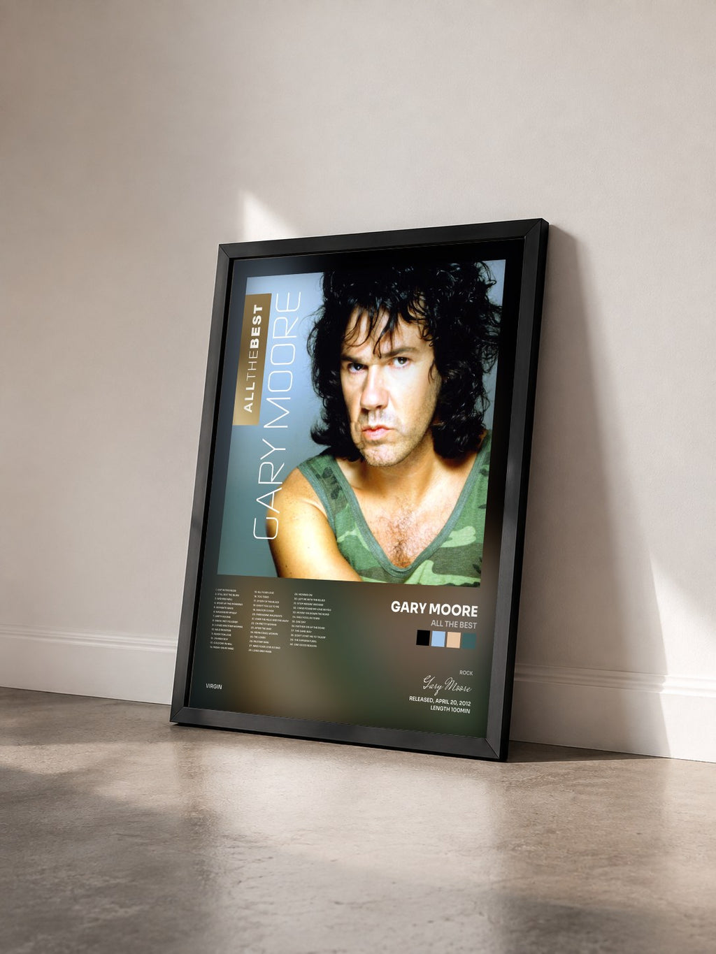 #noir Tableau de l'album All The Best de Gary Moore vu de trois quarts, cadre noir