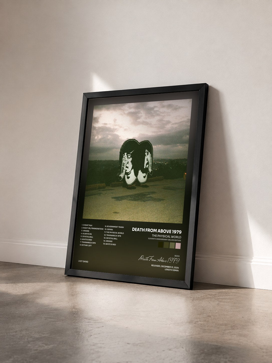 #noir Tableau de l'album The Physical World (Eleventh Anniversary Deluxe Edition) de Death From Above 1979 vu de trois quarts, cadre noir