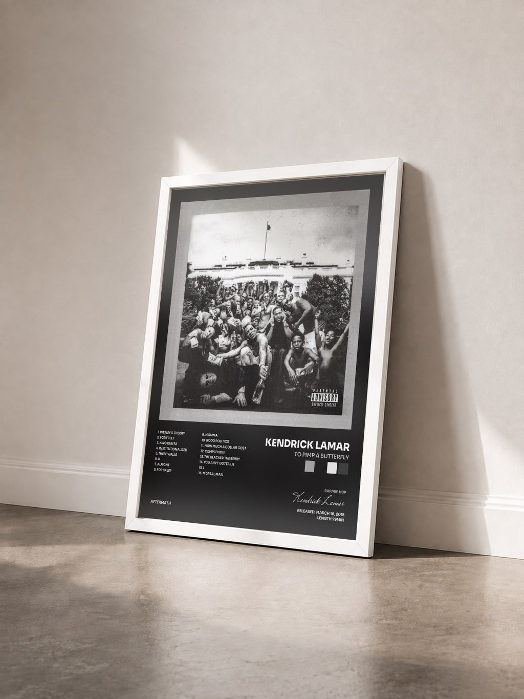 #blanc Tableau de l'album To Pimp A Butterfly de Kendrick Lamar vu de trois quarts, cadre blanc
