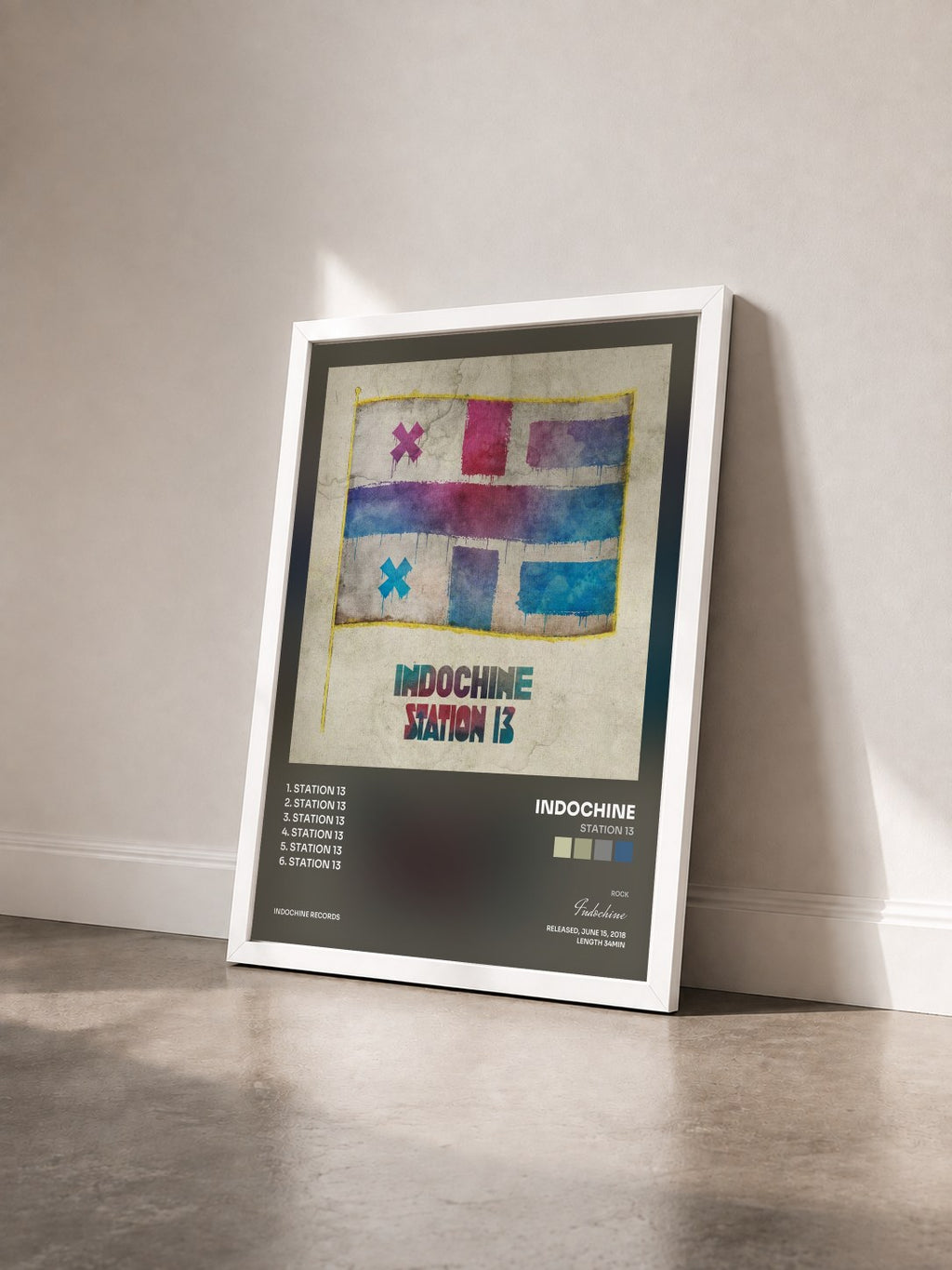 #blanc Tableau de l'album Station 13 de Indochine vu de trois quarts, cadre blanc