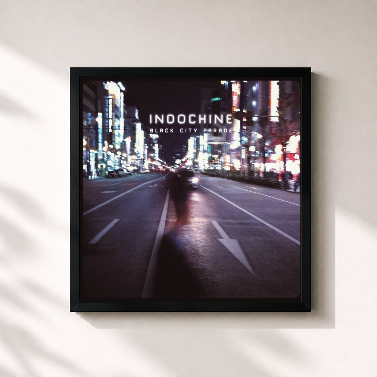 #noir Black City Parade by Indochine as a square framed art print, black 32x32 cm frame