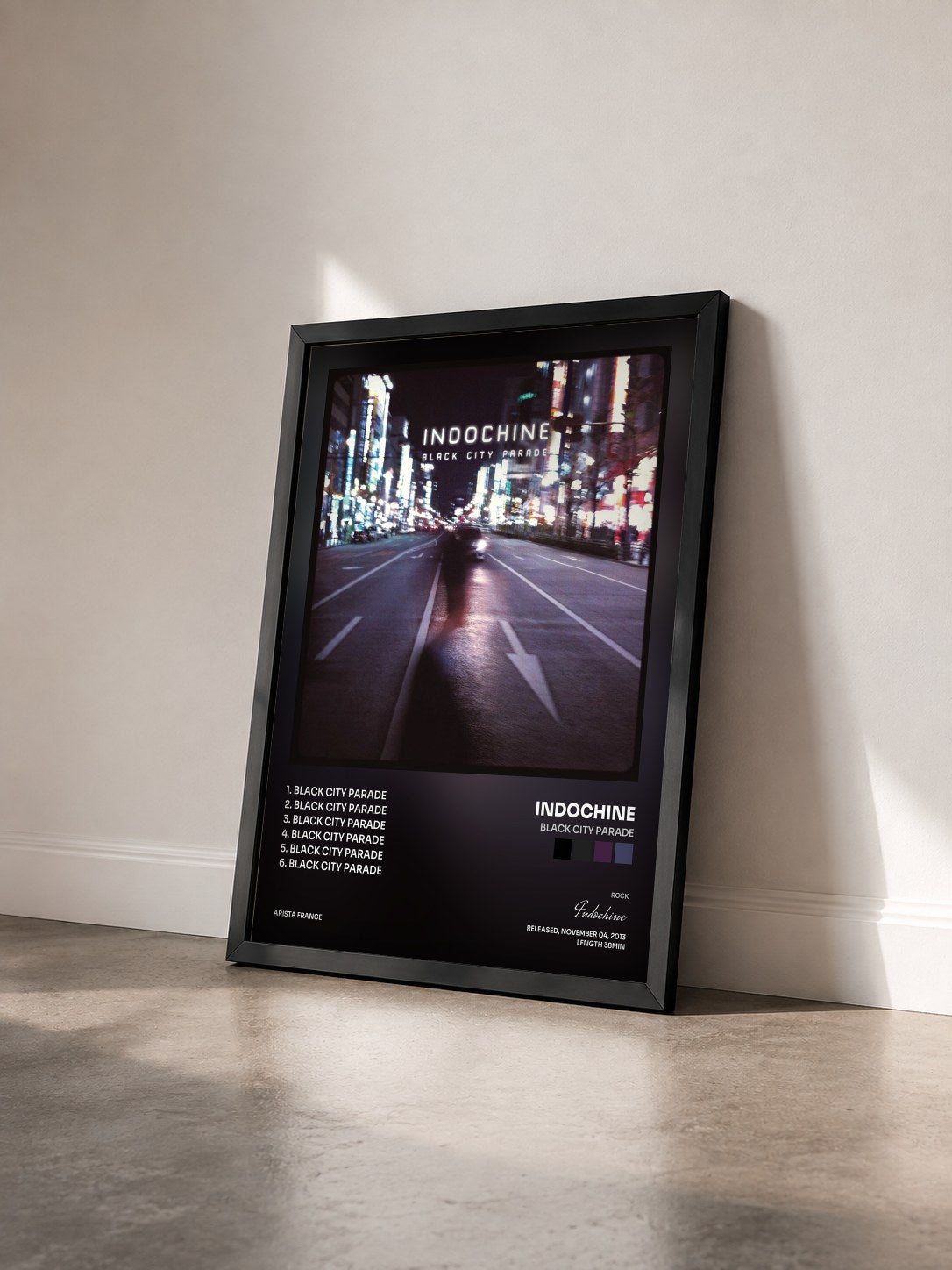 #noir Black City Parade by Indochine as a framed art print seen at an angle, black frame